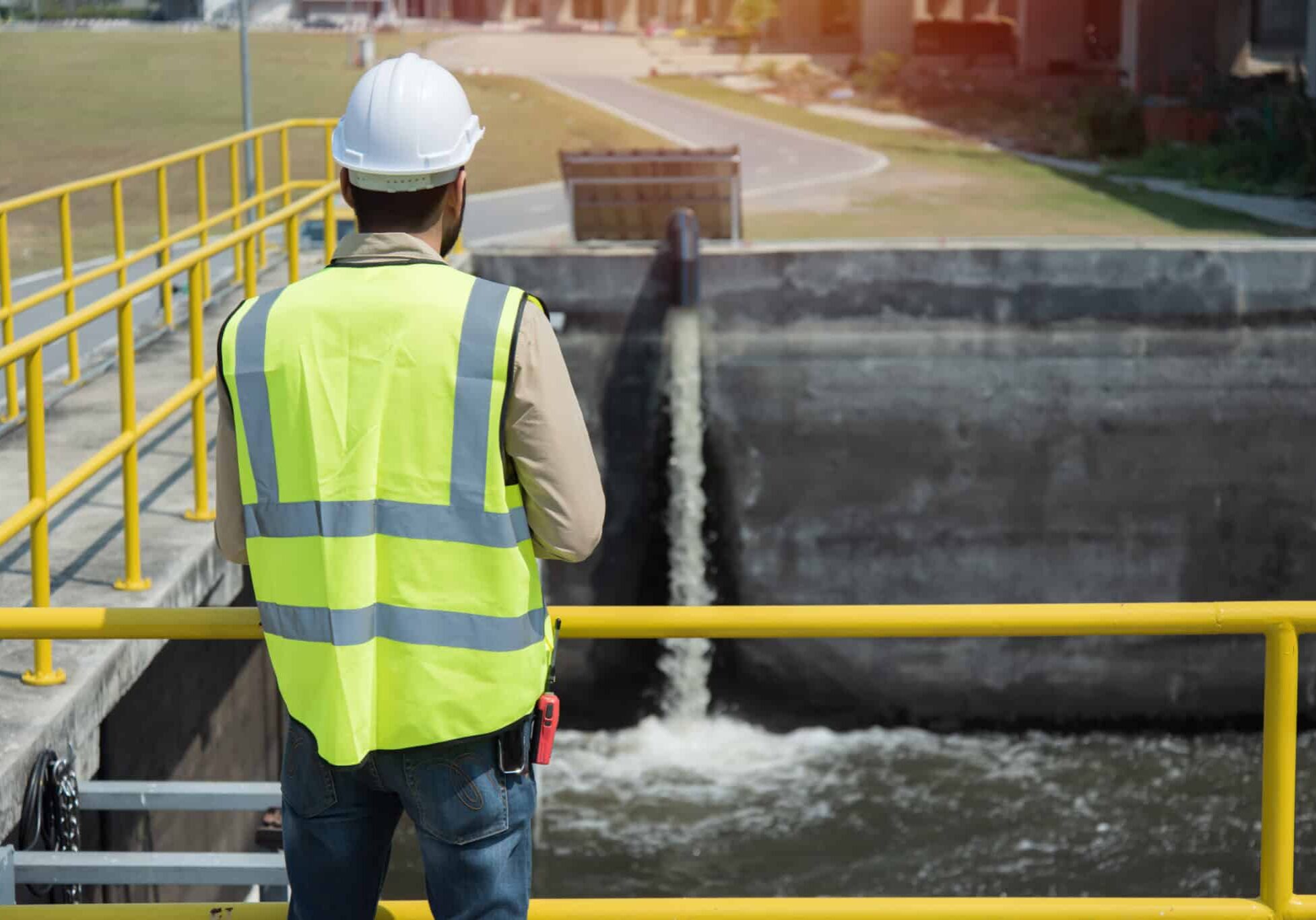 worker on Wastewater treatment concept. Service engineer on was treatment plant audits